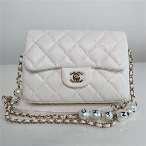 chanel white bag with pearls|Chanel pearl bag price.